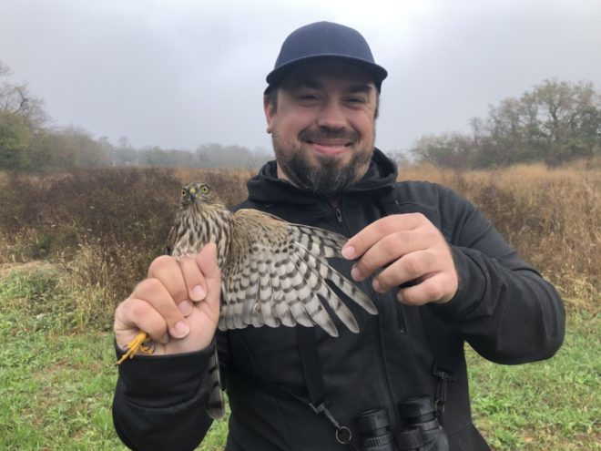 Brian Rusnica with Sharp-shinned Hawk